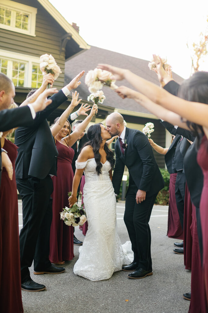 Bride and groom with their wedding party for their fall Ritz Charles wedding in Indianapolis, Indiana