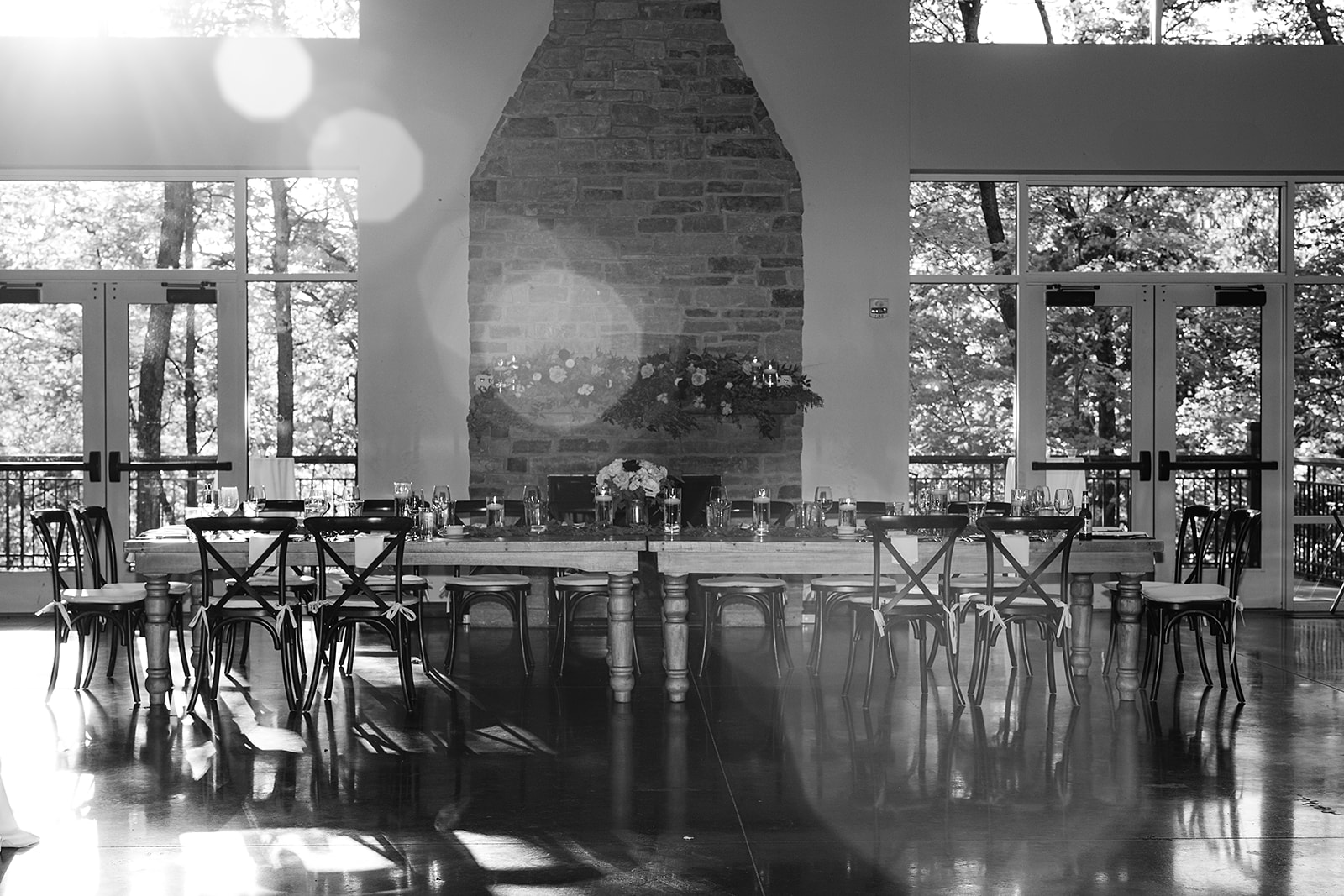 Black and white photo of an indoor Ritz Charles wedding reception in Indianapolis, Indiana