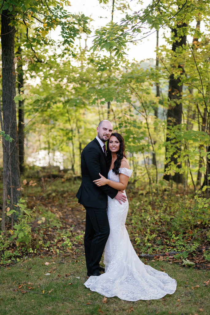 Bride and grooms fall outdoor wedding portraits from their Ritz Charles wedding in Indianapolis, Indiana