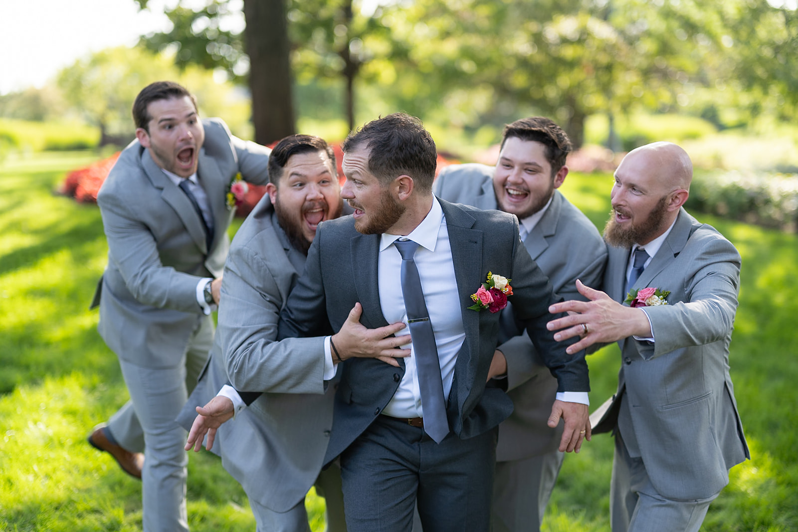 Outdoor groom and groomsmen portraits from a Sky on Nine wedding in Chicago