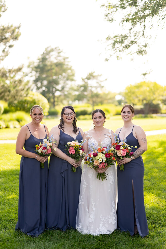 Outdoor bride and bridesmaids portraits from a Sky on Nine wedding in Chicago