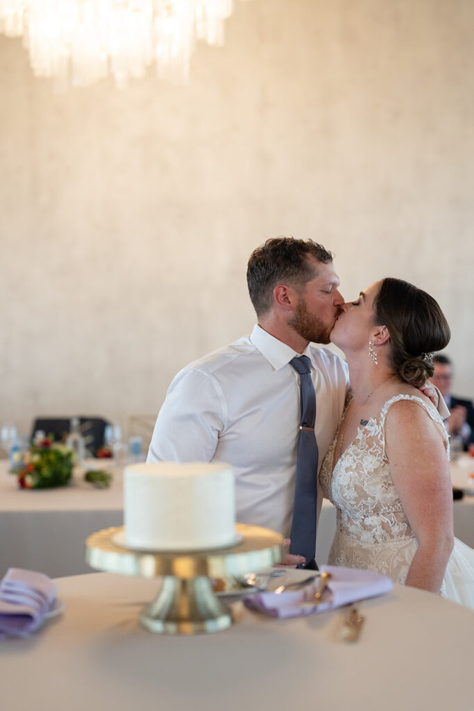 Bride and groom cutting their wedding cake during their Sky on Nine wedding reception in Chicago