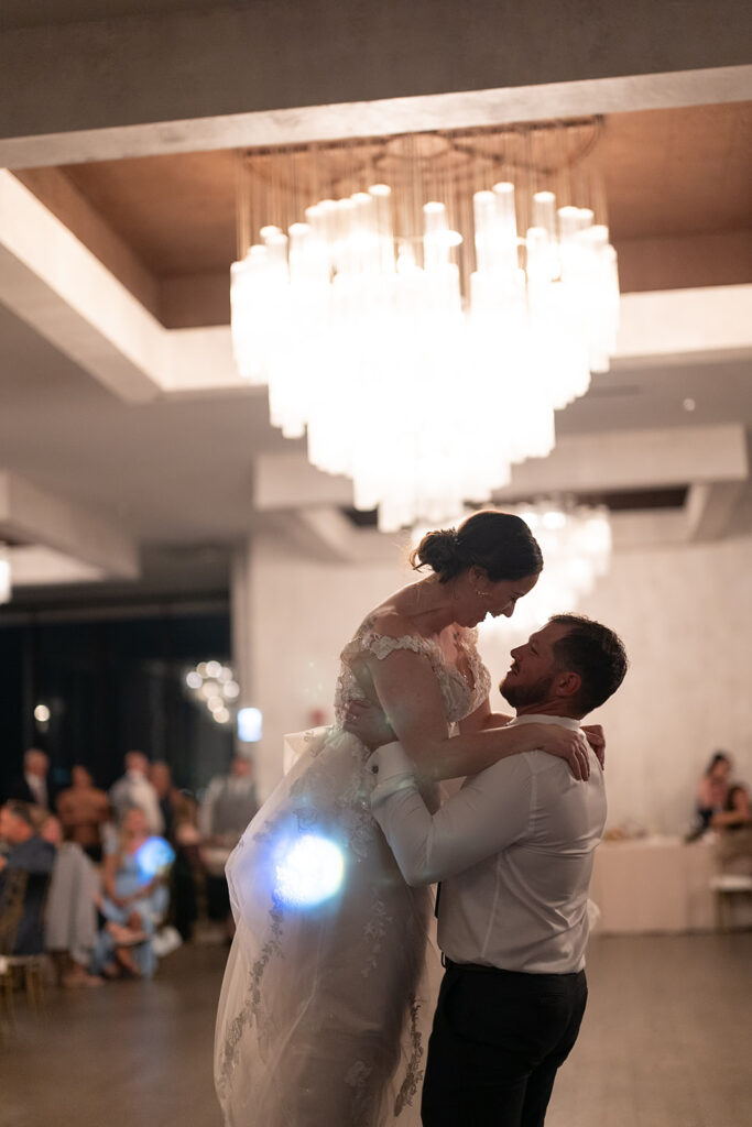 Bride and groom sharing a first dance during their Sky on Nine wedding reception