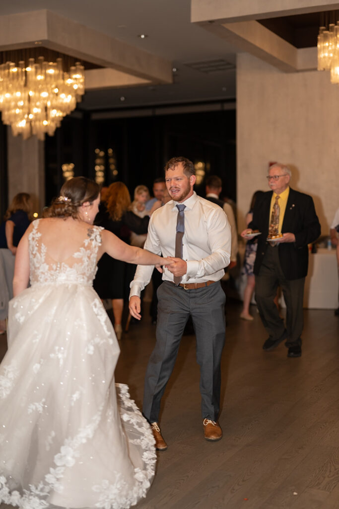 Bride and groom dancing during the reception