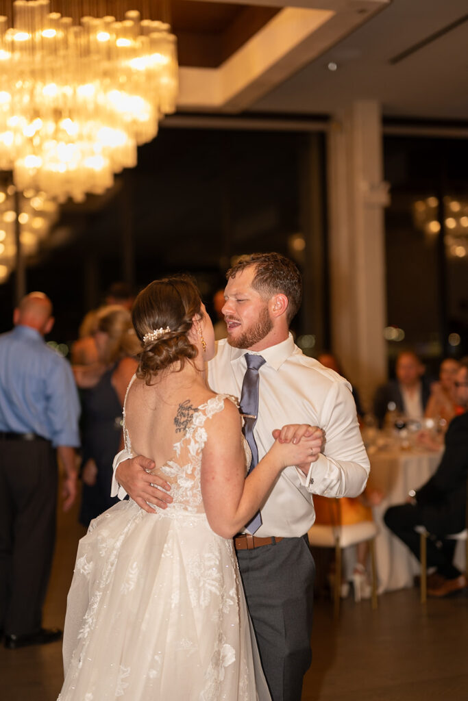 Bride and groom dancing during the reception