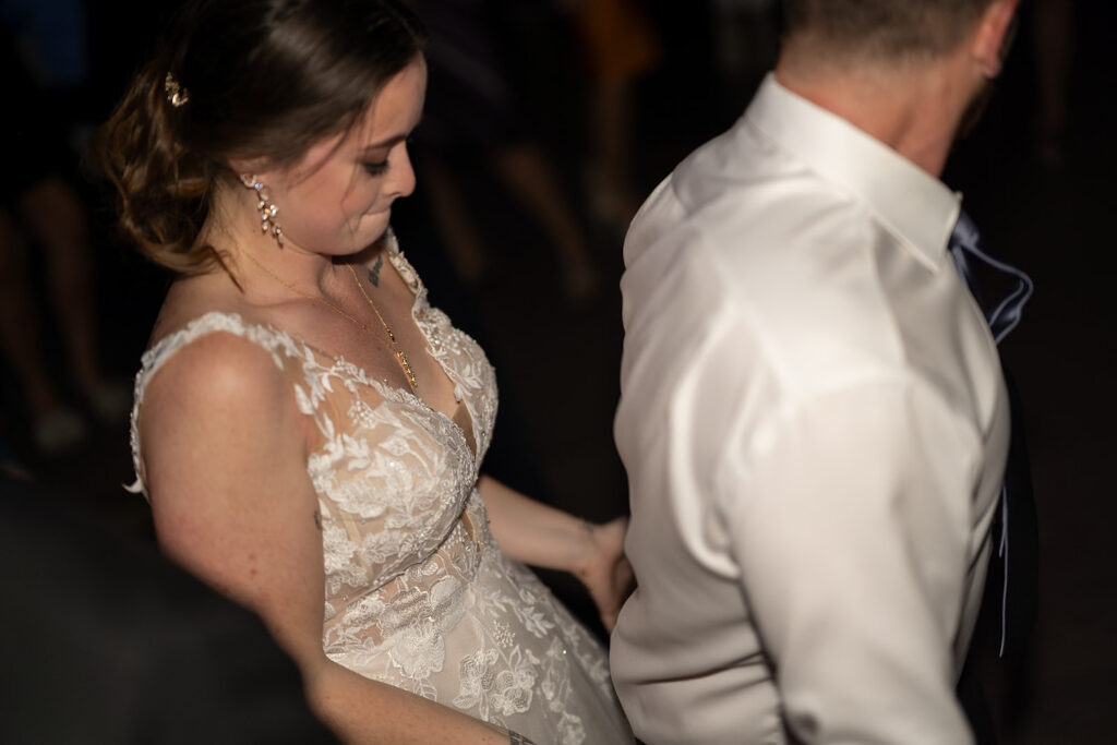 Bride and groom dancing during the reception