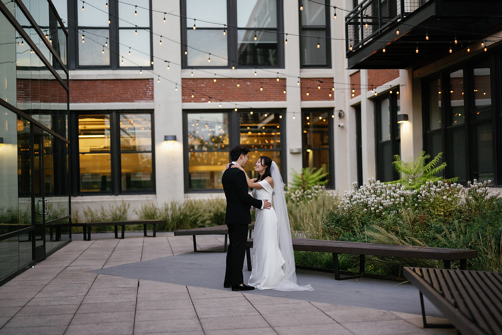 Bride and grooms outdoor Greenhouse Loft Chicago wedding portraits