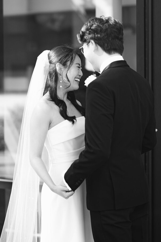 Bride and groom sharing a first look outdoors for their Greenhouse Loft Chicago wedding