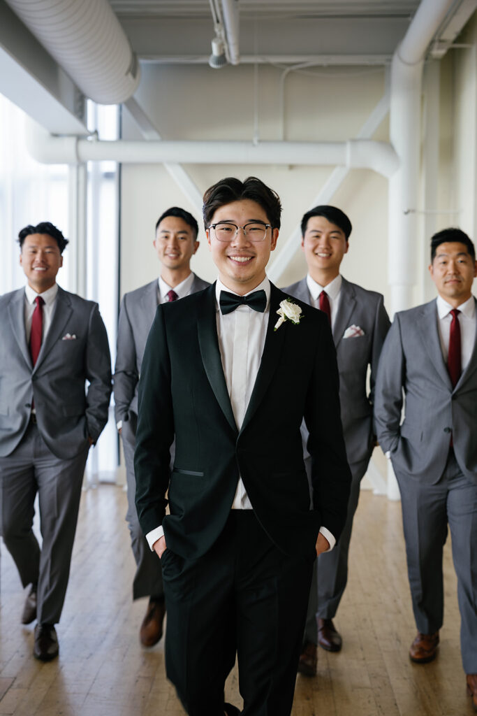 Indoor groom and groomsmen portraits from a Greenhouse Loft Chicago wedding