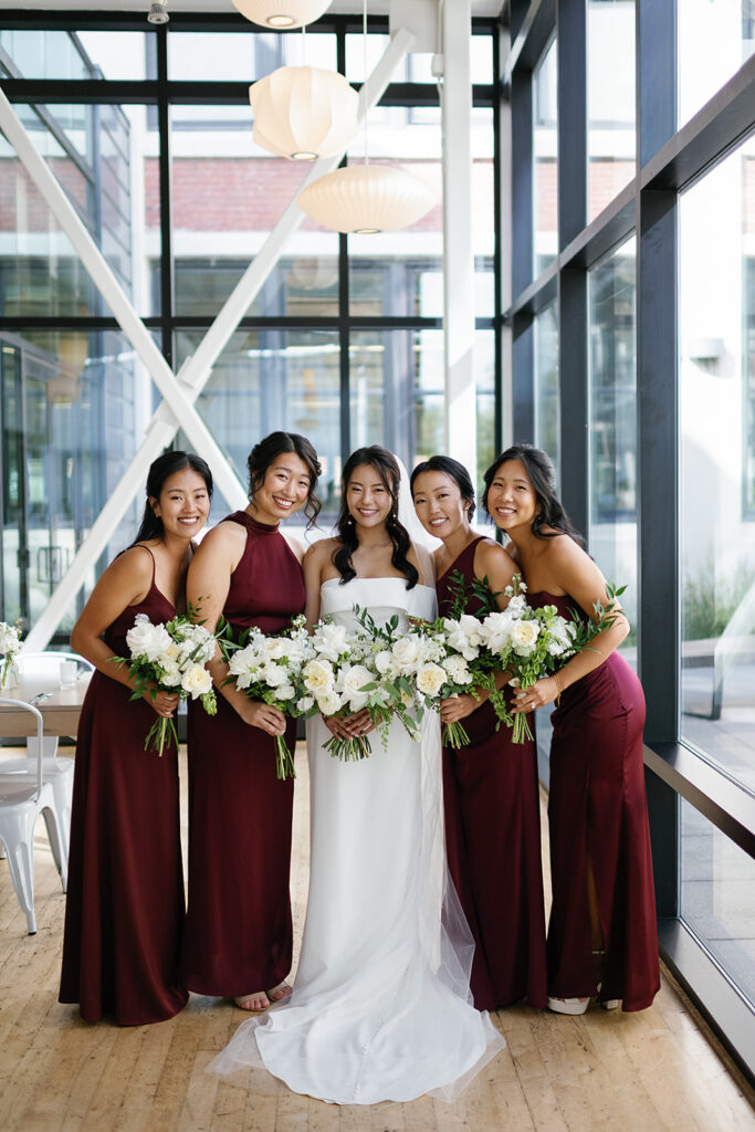 Indoor bride and bridesmaids portraits from a Greenhouse Loft Chicago wedding