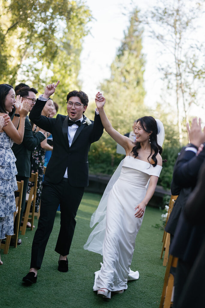 Bride and groom walked down the aisle as husband and wife after their Greenhouse Loft Chicago wedding ceremony