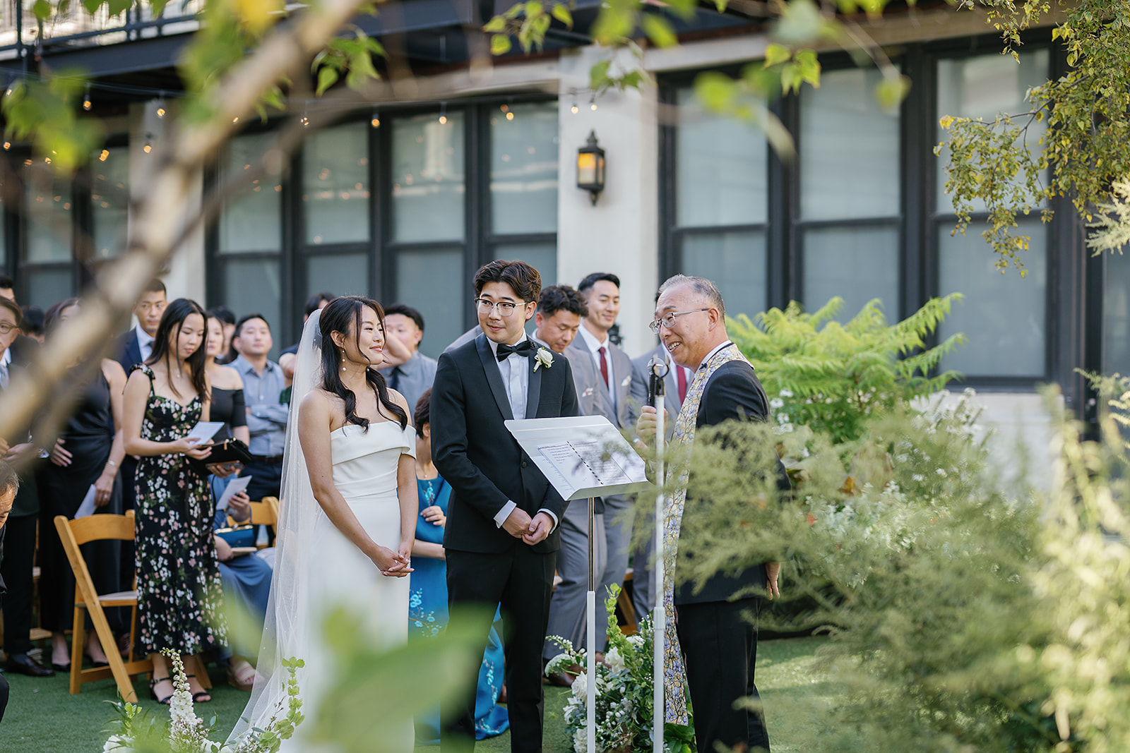 An outdoor Greenhouse Loft Chicago wedding ceremony in the sky garden