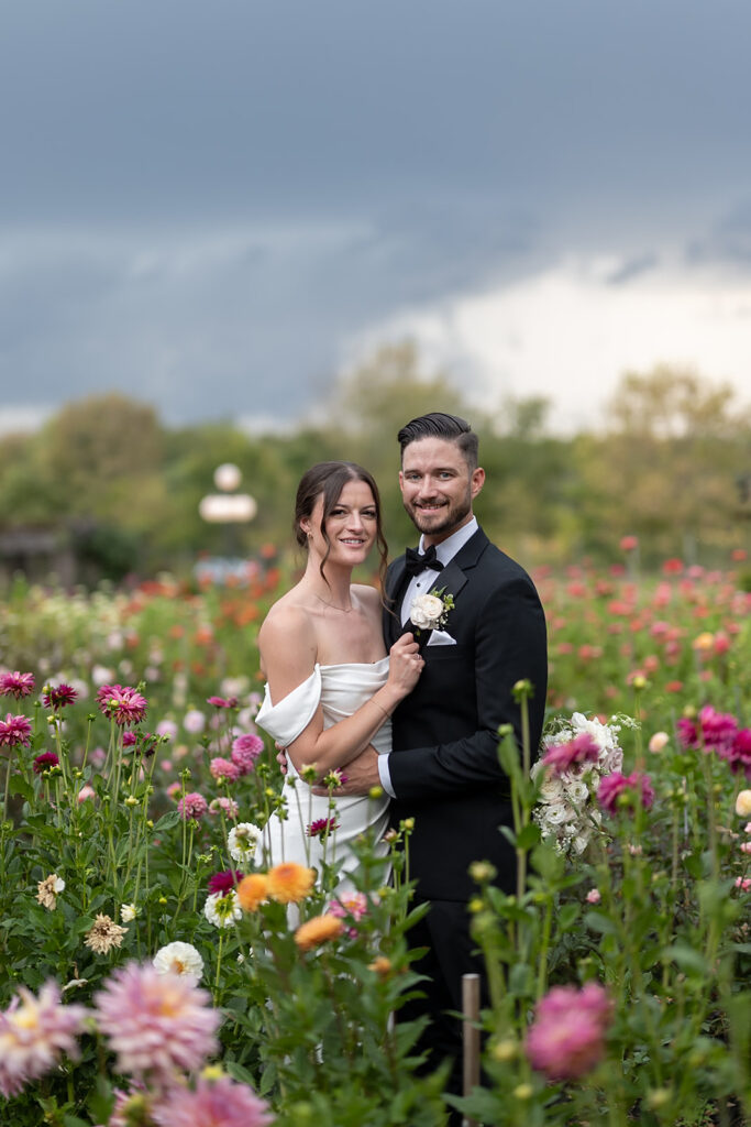 Bride and grooms portraits in the gardens at Artisan Acres Estate wedding venue