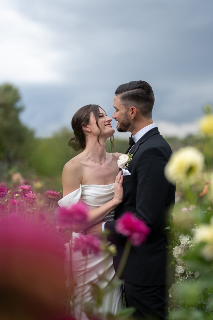 Bride and grooms portraits in the gardens at Artisan Acres Estate wedding venue