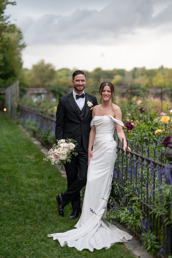 Bride and grooms portraits in the gardens at Artisan Acres Estate wedding venue