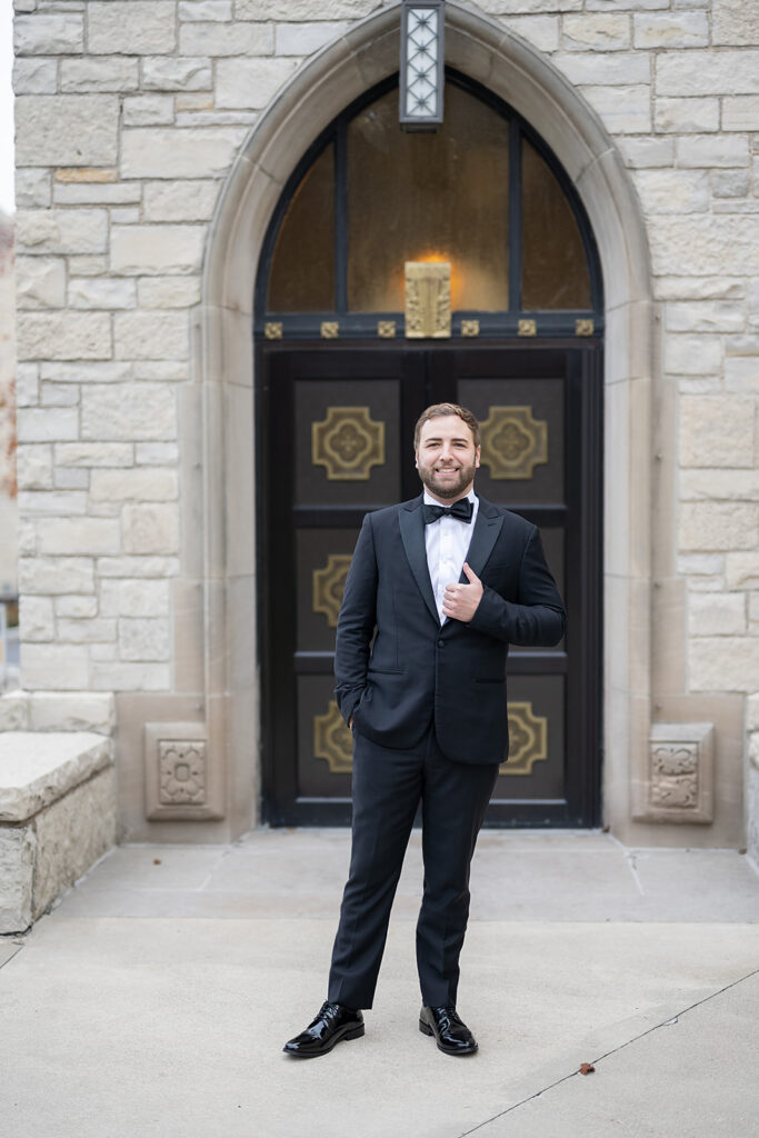 Grooms portraits outside of Cathedral of Immaculate Conception in Fort Wayne, Indiana