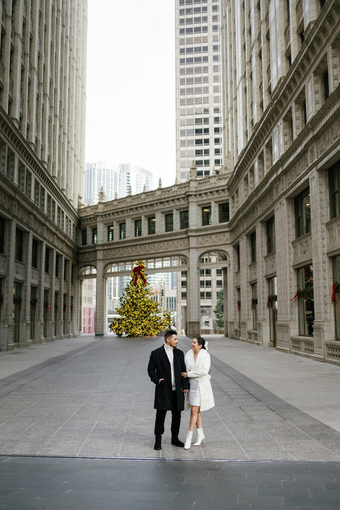 Couples downtown Chicago engagement photos at the Wrigley Building