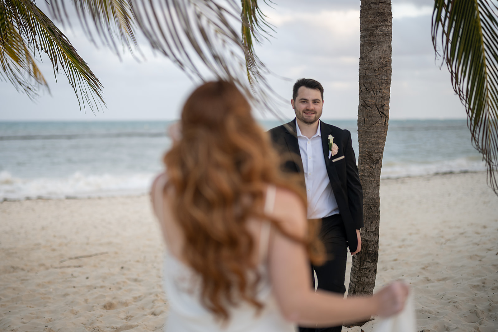 Bride and grooms editorial destination wedding photos on a beach in Cancun