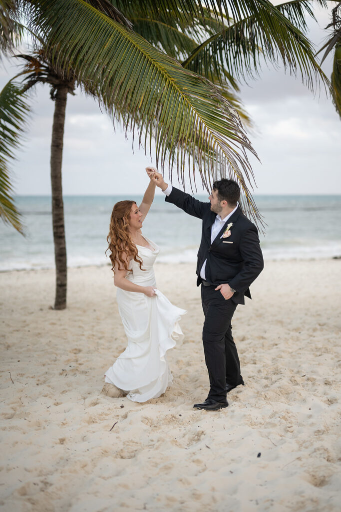 Bride and grooms destination wedding photos on a beach in Cancun