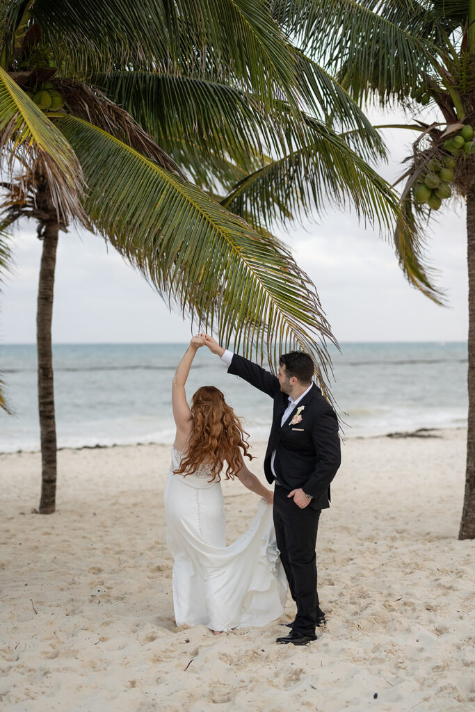Bride and grooms destination wedding photos on a beach in Cancun