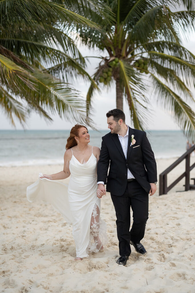 Bride and grooms destination wedding photos on a beach in Cancun