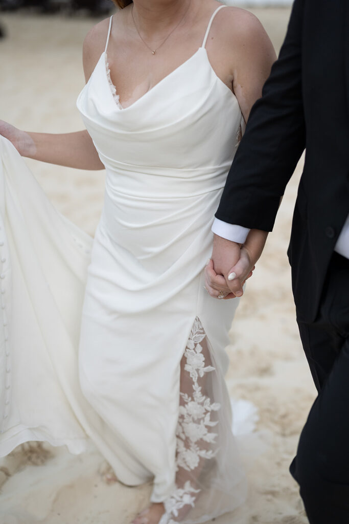 Bride and grooms destination wedding photos on a beach in Cancun