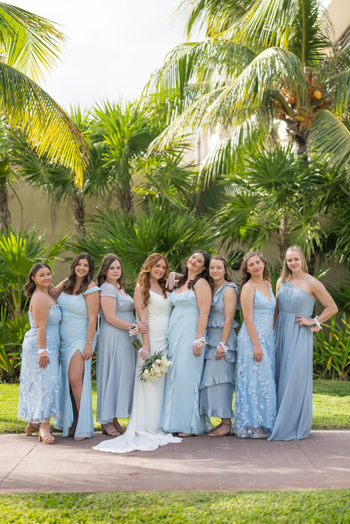 Outdoor bride and bridesmaids photos from a Royalton Riviera Cancun wedding