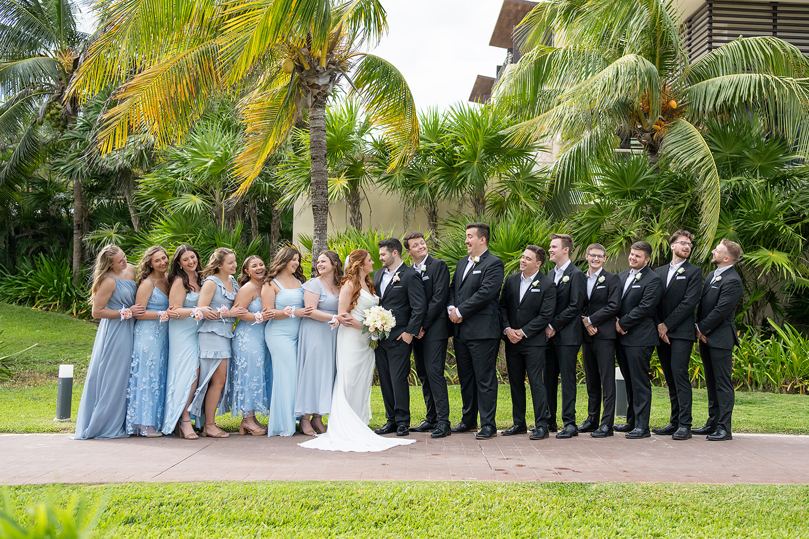 Outdoor wedding party photos from a Royalton Riviera Cancun wedding
