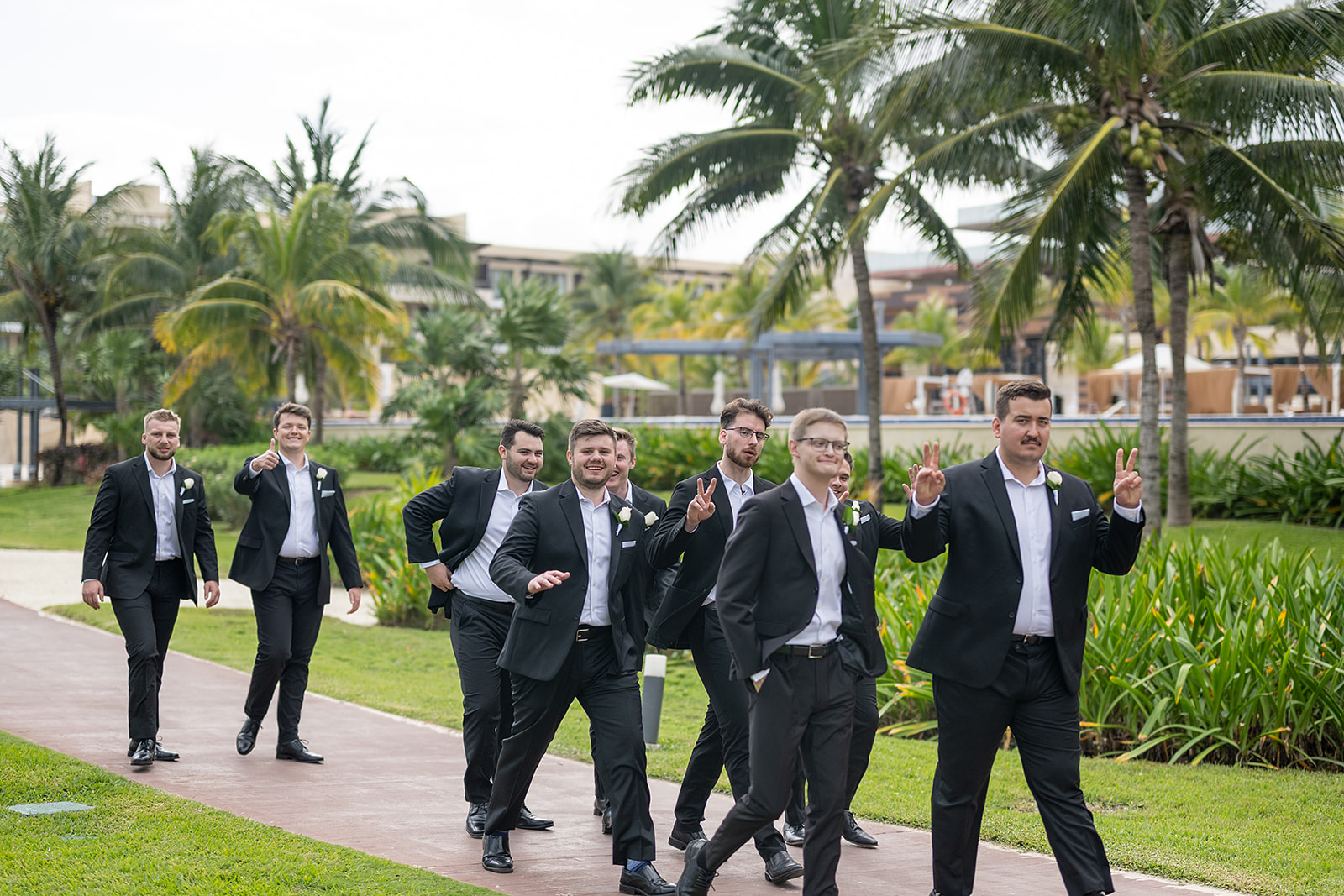 Outdoor groom and groomsmen photos from a Royalton Riviera Cancun wedding