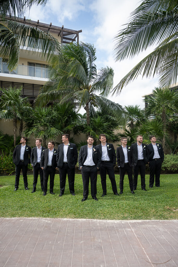 Outdoor groom and groomsmen photos from a Royalton Riviera Cancun wedding