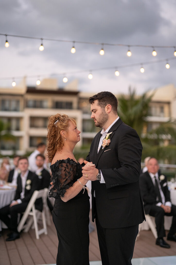 Groom dancing with his mother