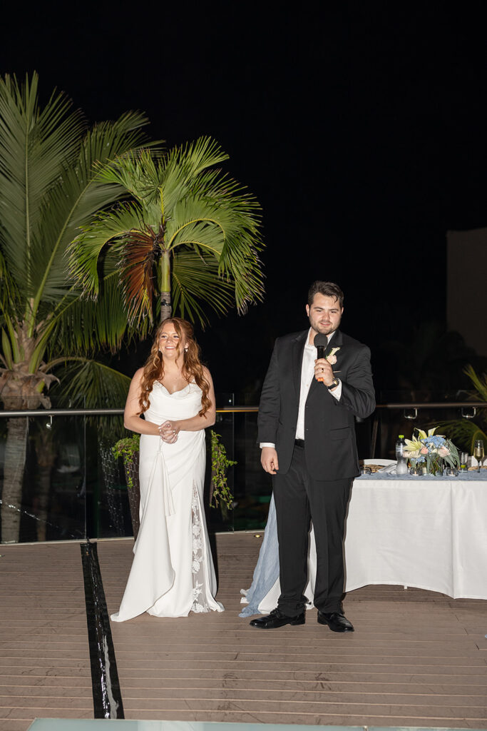 Bride and groom giving speech