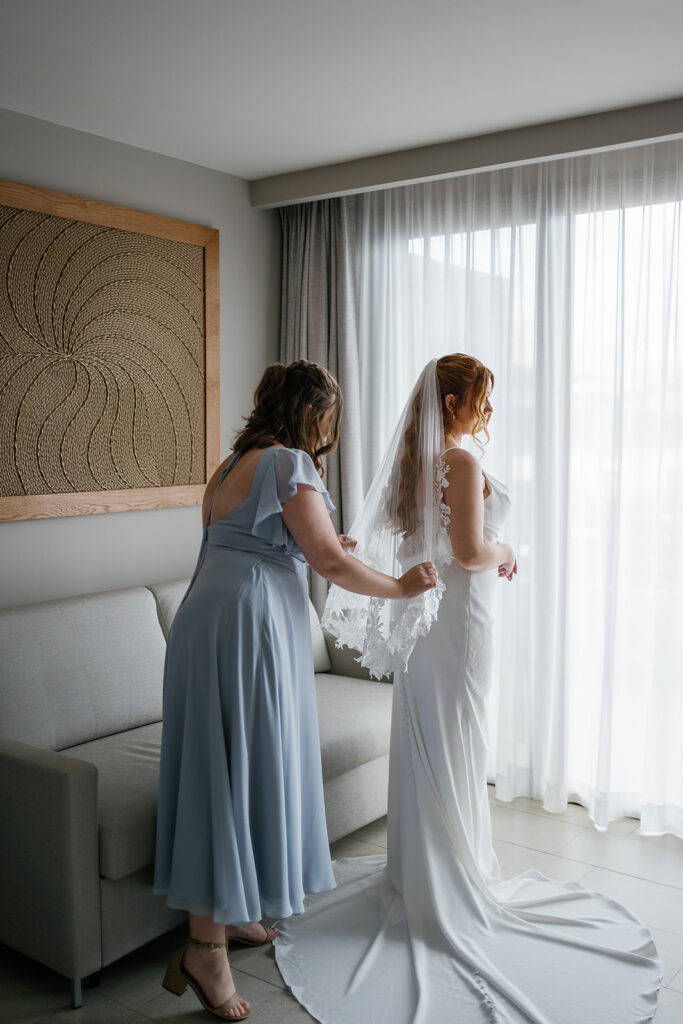 Bride getting ready with her mother