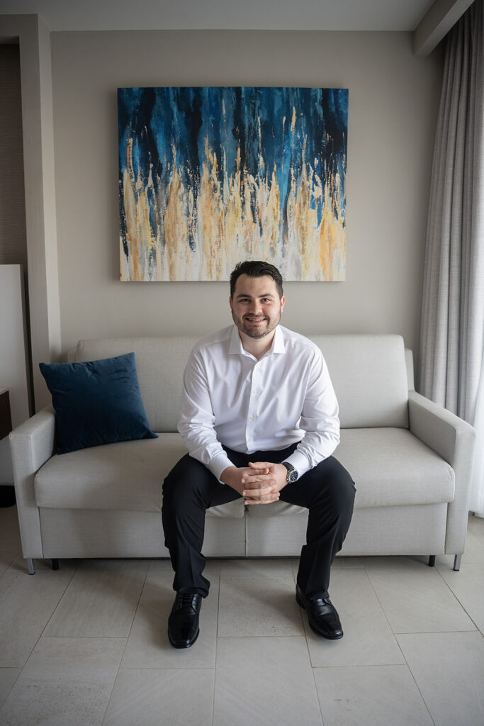 Indoor grooms portraits from a destination Royalton Riviera Cancun Wedding