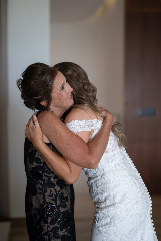Mother and bride getting emotional after gift exchange