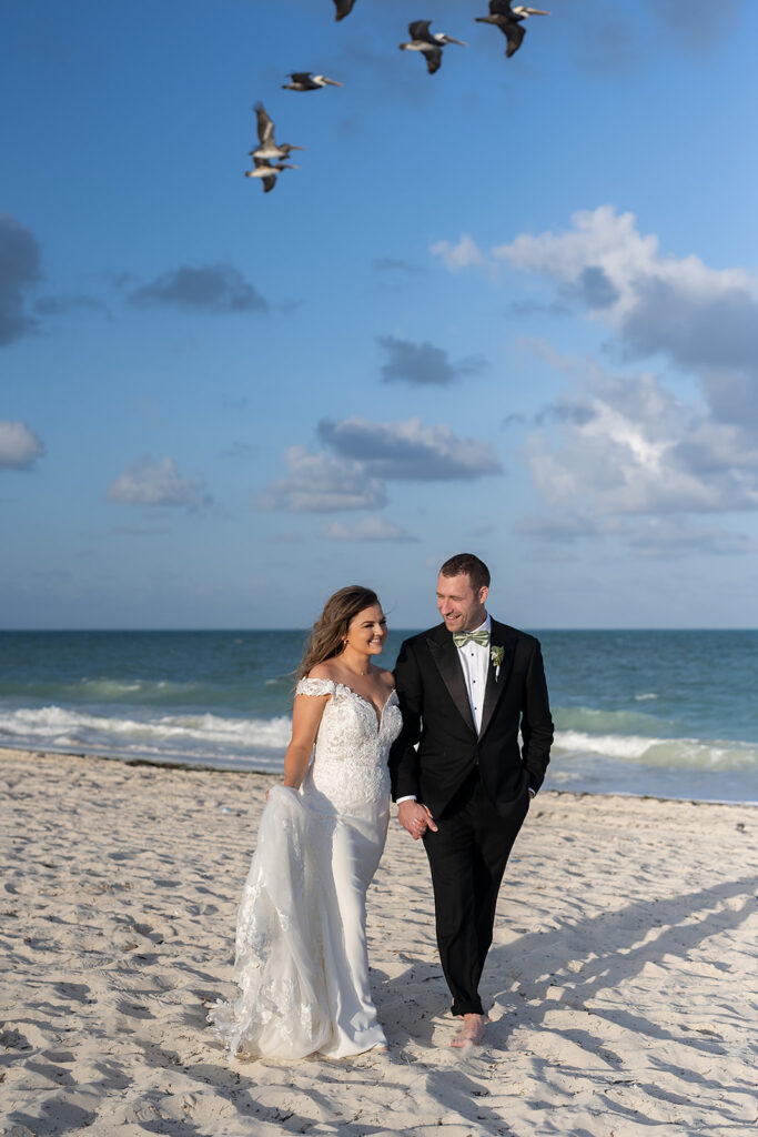 Bride and grooms portraits from their Grand Palladium Costa Mujeres wedding on the beach