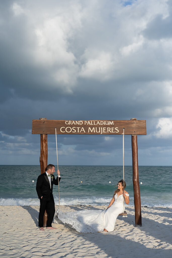Bride and grooms portraits on the beach from their Grand Palladium Costa Mujeres wedding on the beach