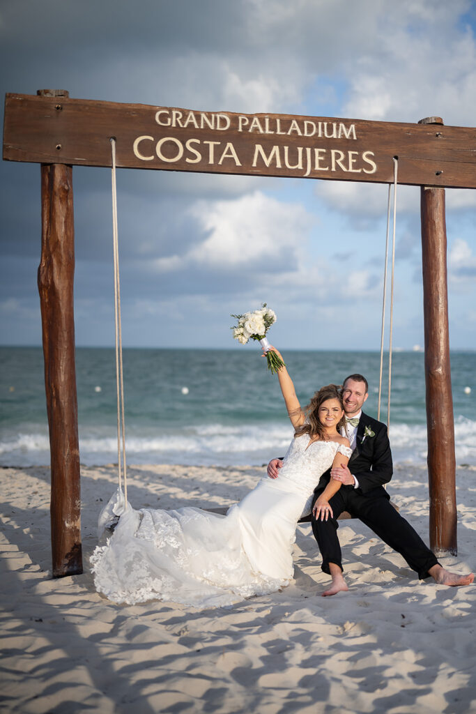 Bride and grooms portraits on the beach from their Grand Palladium Costa Mujeres wedding on the beach