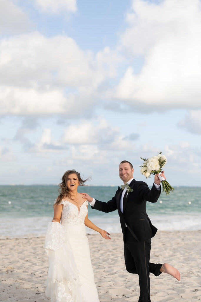Bride and grooms portraits on the beach from their Grand Palladium Costa Mujeres wedding on the beach