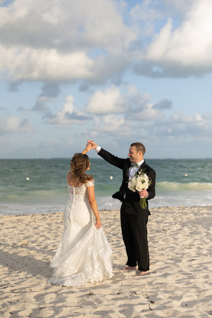 Bride and grooms portraits on the beach from their Grand Palladium Costa Mujeres wedding on the beach