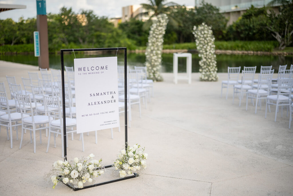 An outdoor Grand Palladium Costa Mujeres wedding ceremony at Deck in The Village