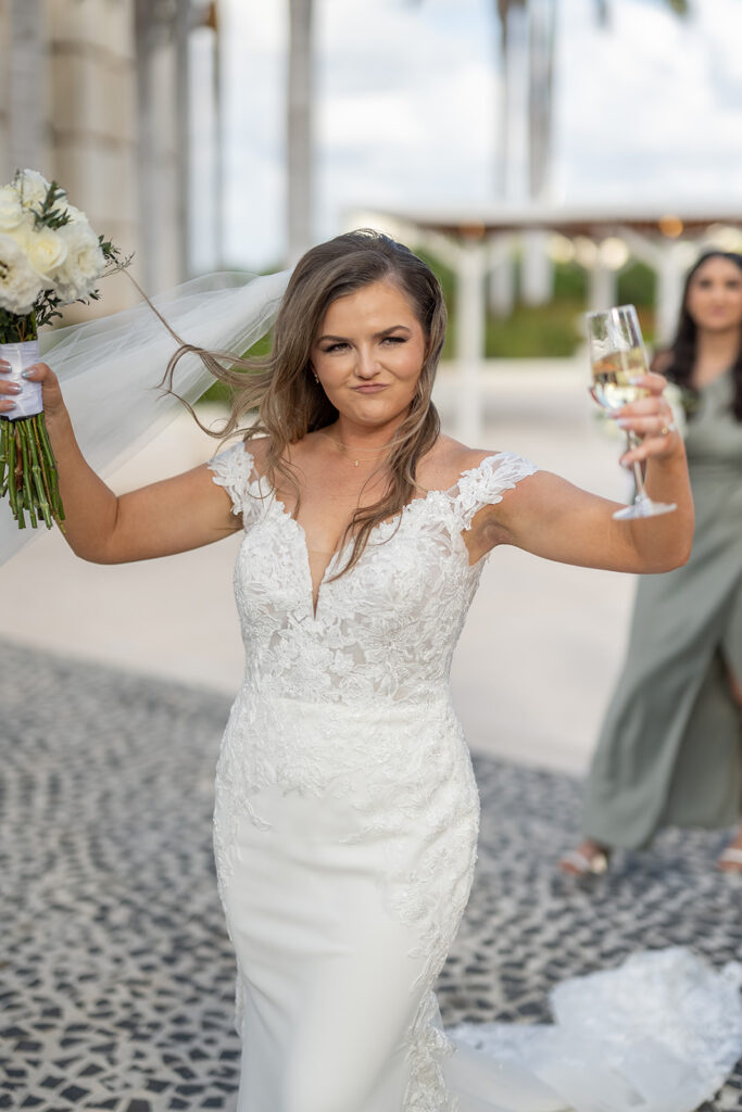 Bride having champagne after her ceremony