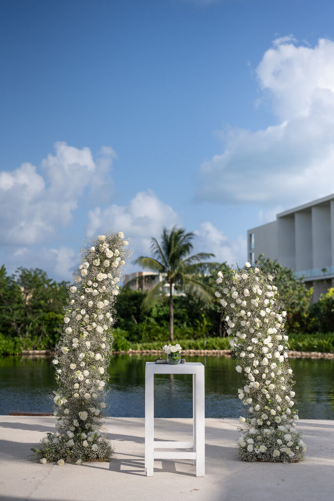 An outdoor Grand Palladium Costa Mujeres wedding ceremony at Deck in The Village