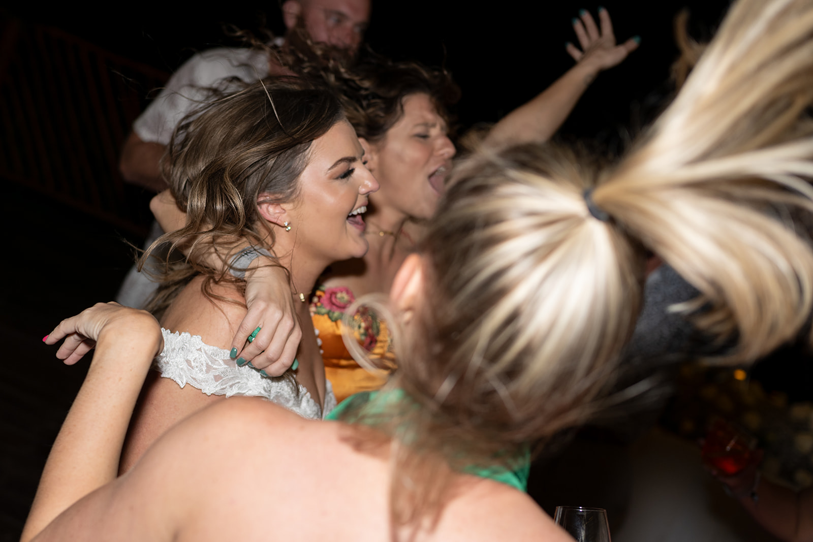 Bride dancing with guests
