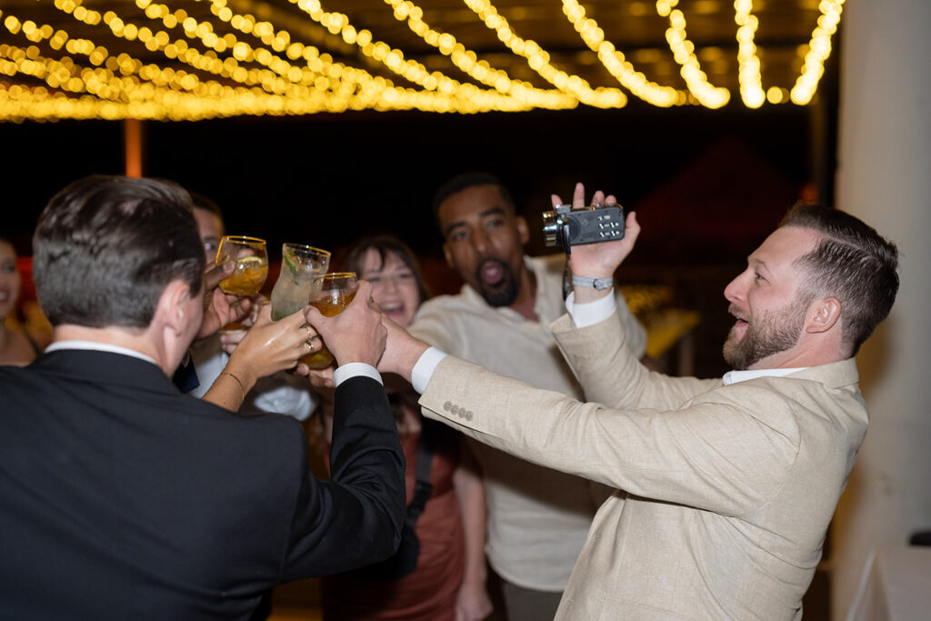 Wedding guest recording on a camera