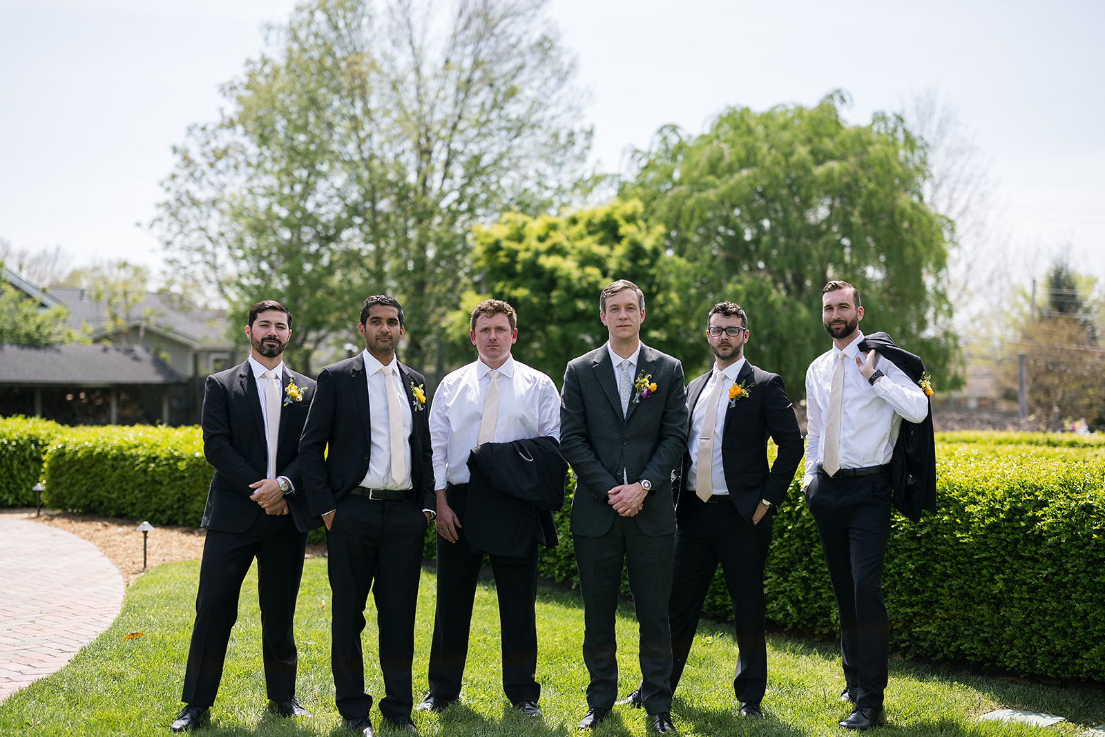 Outdoor groom and groomsmen photos from an Asheville micro wedding at The Bunn House