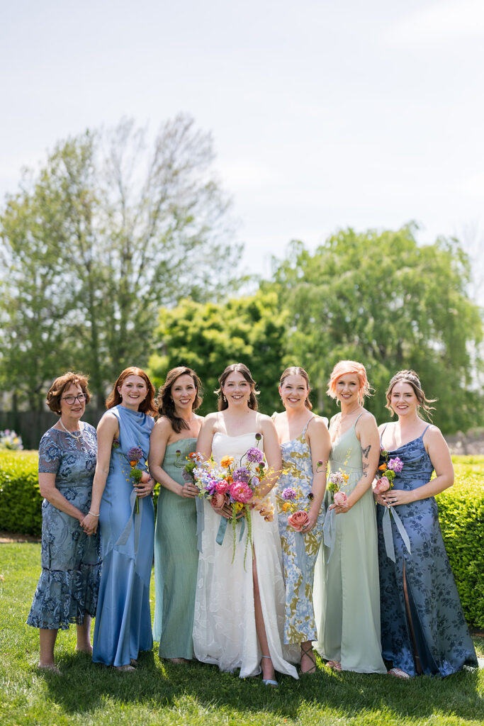 Outdoor bride and bridesmaids portraits from an Asheville micro wedding at The Bunn House