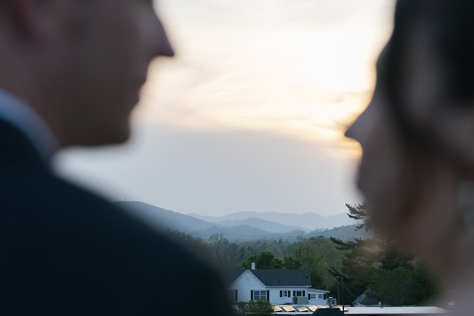 Bride and grooms Asheville wedding portraits from the rooftop of The Bunn House