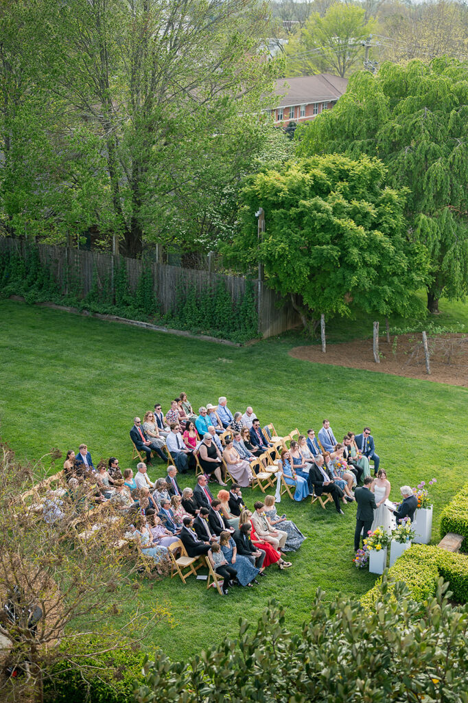 Drone wedding photos of an intimate outdoor micro wedding ceremony at The Bunn House in Asheville, NC