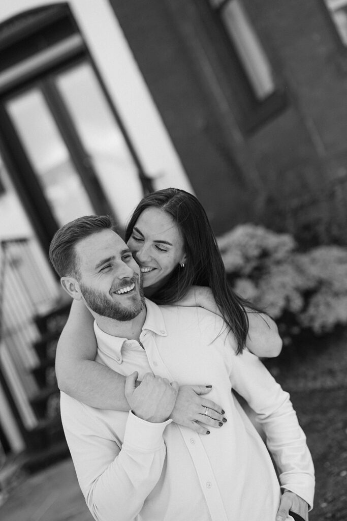 Black and white engagement photo of a couple posing for their engagement photos in Washington DC